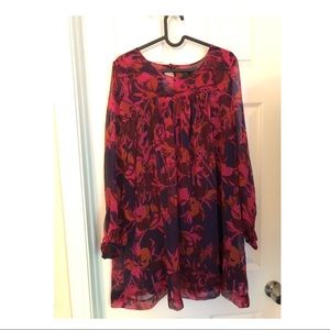 Pink and purple flared dress .